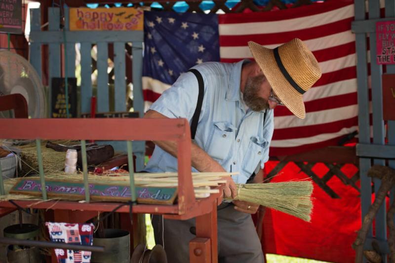 Man making a broom at Kutztown-Folk-Festival