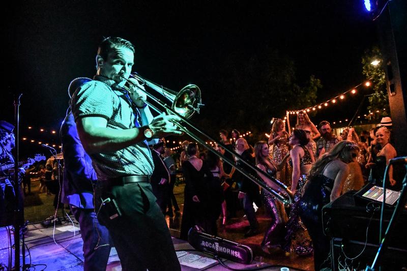 Trombone player performing at the Mermaid Ball.