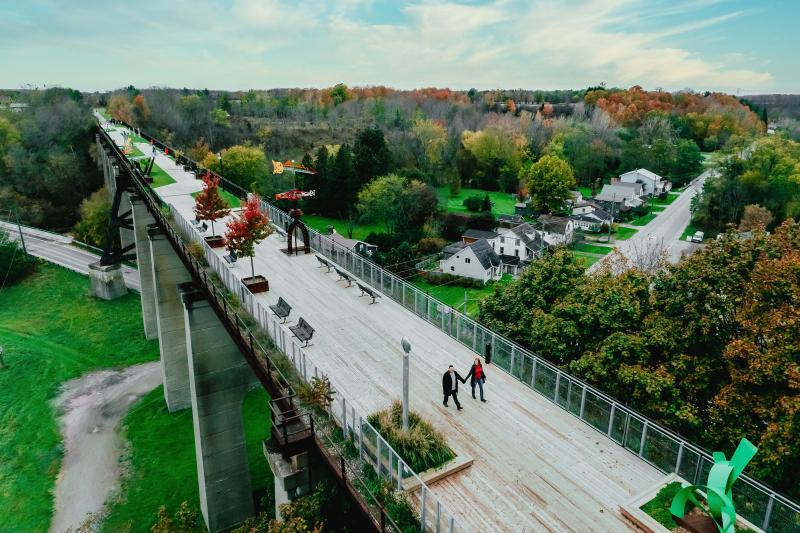 couple walking on elevated park