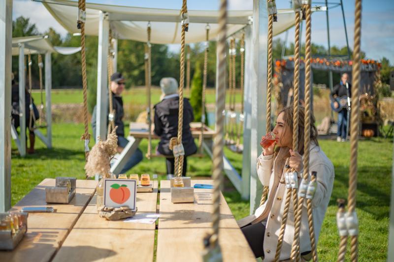 woman tasting on swing picnic table