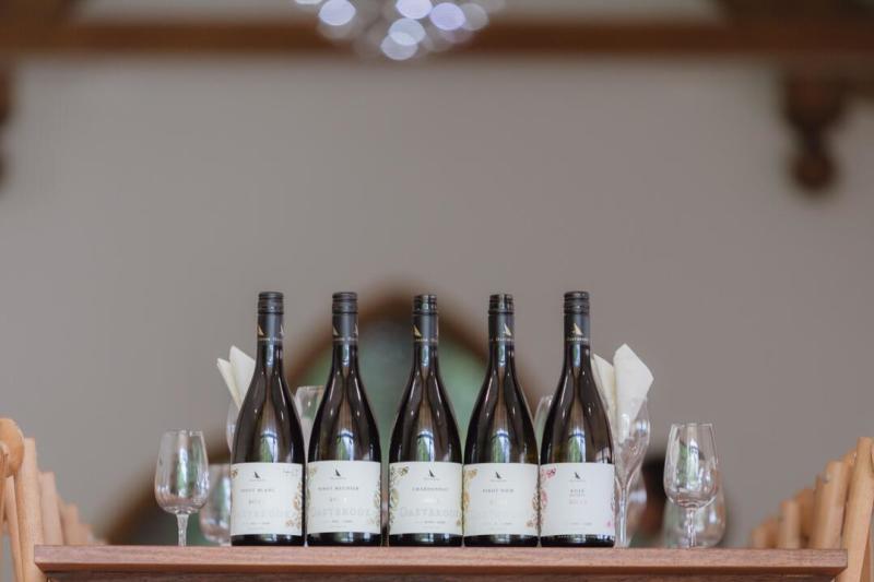 Oastbrook five wine bottles in a row