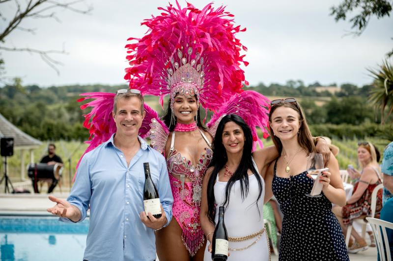 A Summer party at Oastbrook vineyard with Samba dancers and owners of the vineyard