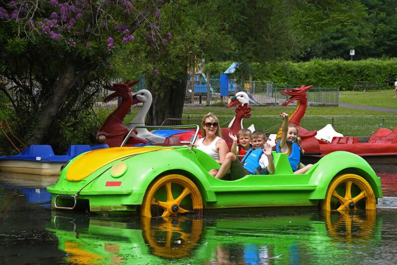 A family riding a car shaped pedalo on Singelton boating latke.
