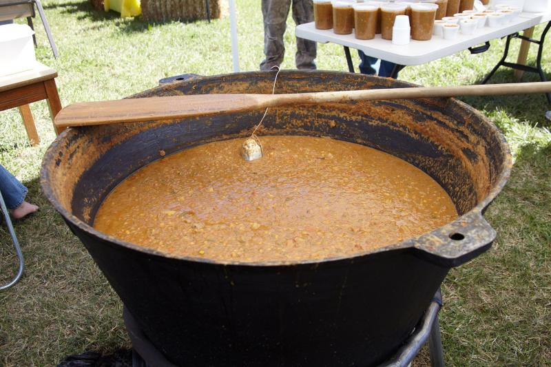 Stewpots and cups of "Brunswick Stew" at the annual Brunswick Stew Festival.