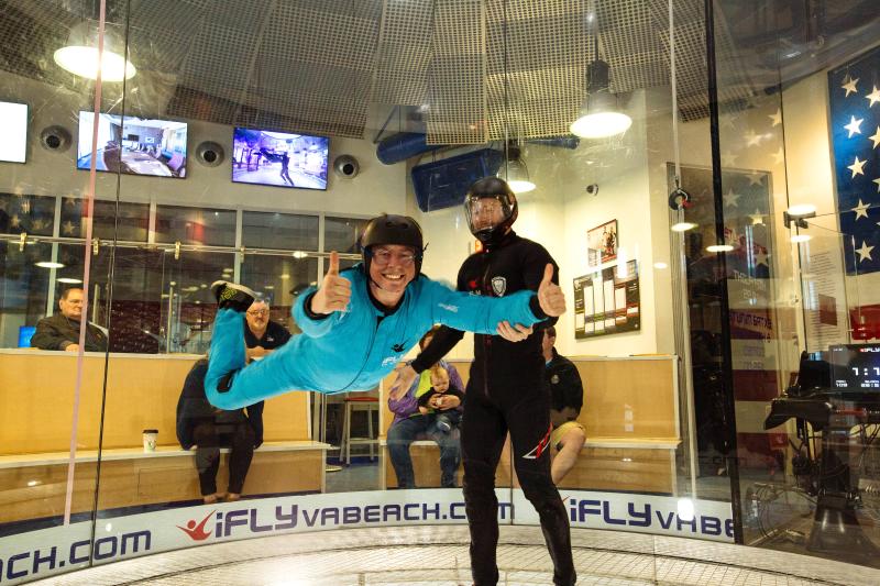 Person giving a thumbs up while indoor skydiving at iFly in Virginia Beach