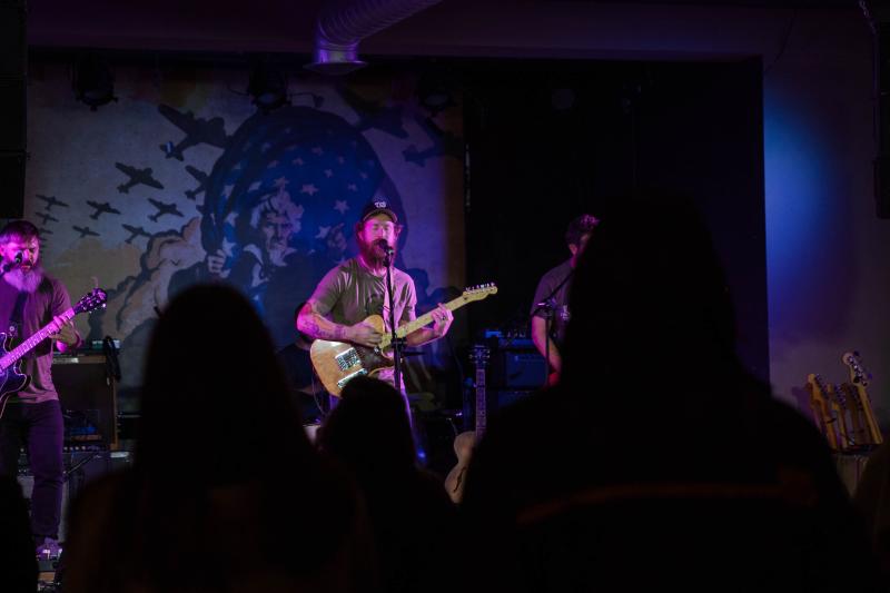 band playing at indoor venue