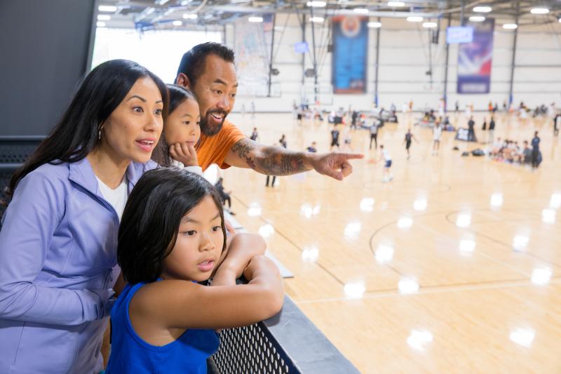 Family watching sports game