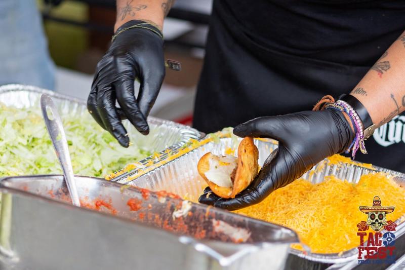 Serving Fresh Tacos at Wichita Taco Fest