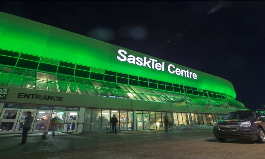 sasktel centre lit up in green