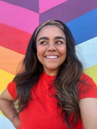 Morgan Pelt in front of Funk Mural