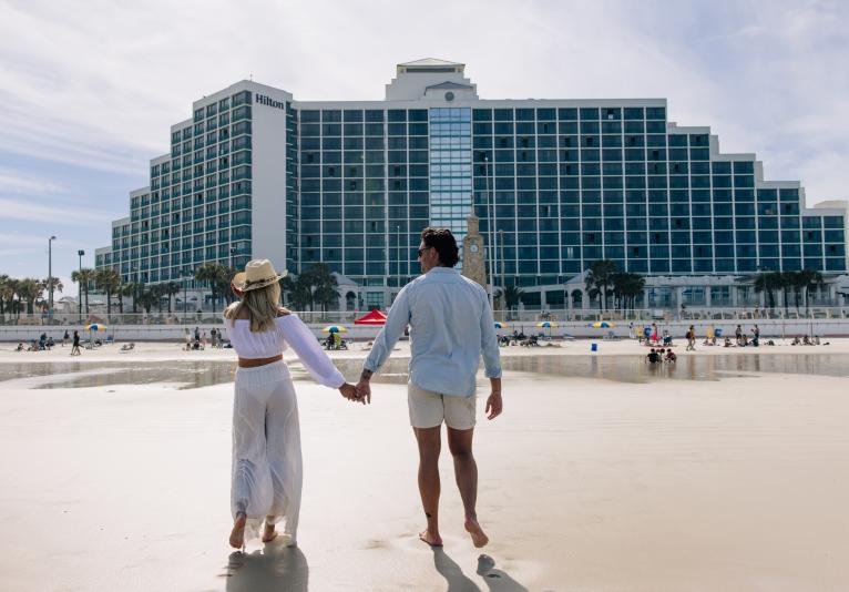 Couple In front of Hilton Daytona Beach