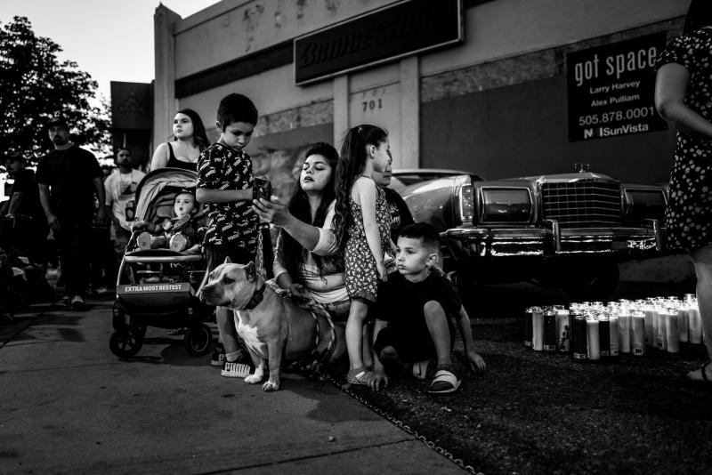 Woman and children with lowrider