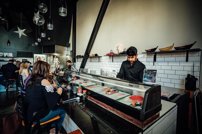 The interior and counter at Diaz Kitchen and Sushi Bar