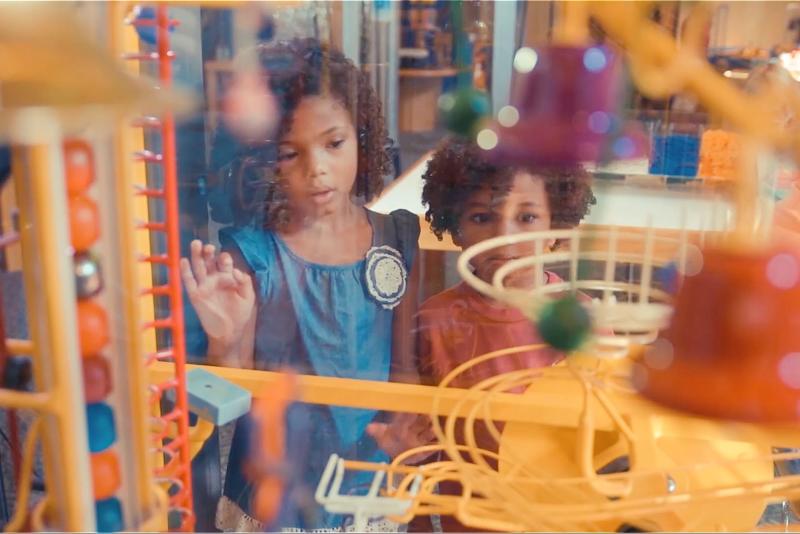 Kids looking at a display at the WonderLab in Bloomington