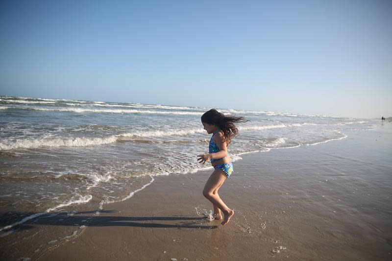 beach little girl running