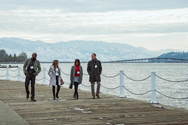 Meeting Group Walking on Boardwalk