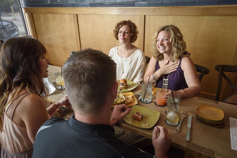 Group of people dining at Bourbon & Baker