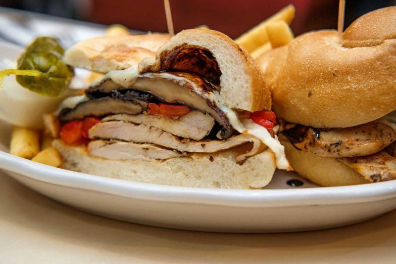 Grilled portobello mushroom chicken sandwich with balsamic vinaigrette roasted red peppers and provolone cheese