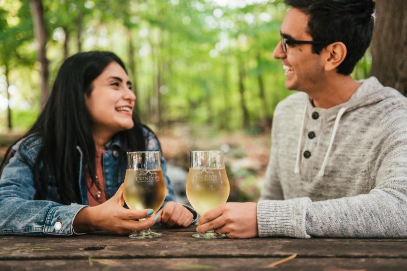 Couple enjoying cider