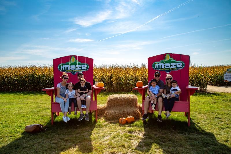 family sitting on chairs