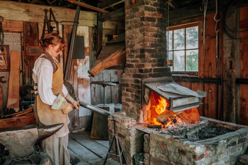woman in blacksmith shop