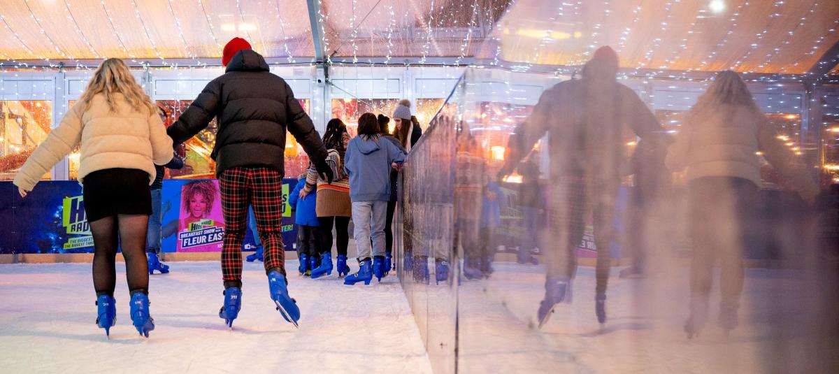 Family ice skating at Trafford Centre