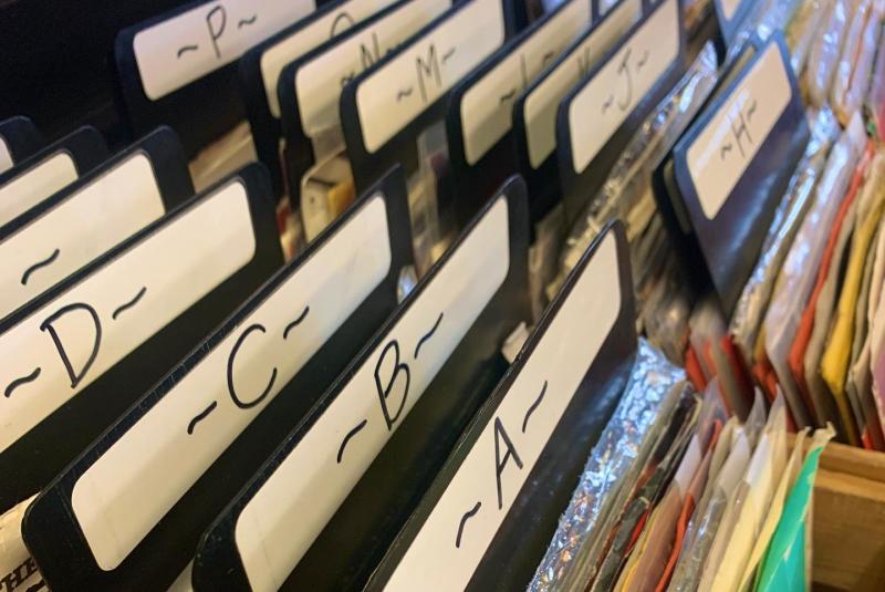 A close-up of records in bins at Charley's Records and CDs