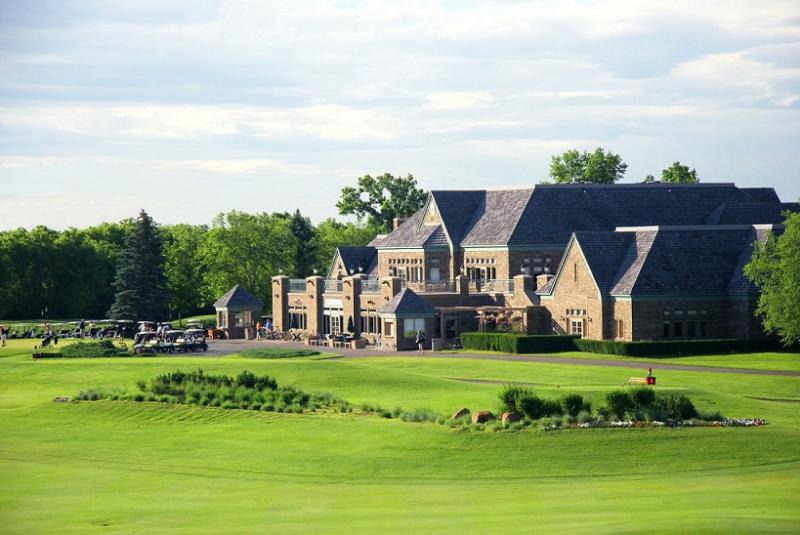The large, castle-like clubhouse at Edinburgh USA golf club in Brooklyn Park, MN