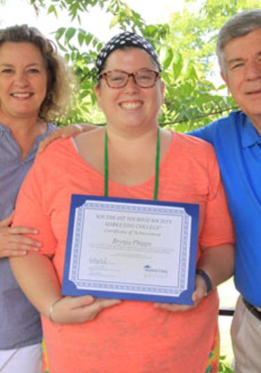Brynja Phipps, Project Coordinator for the Punta Gorda/Englewood Beach Visitor & Convention Bureau (center) with Suzanne Moon, VP Operations for the Southeast Tourism Society and Bill Hardman, President and CEO for the Southeast Tourism Society