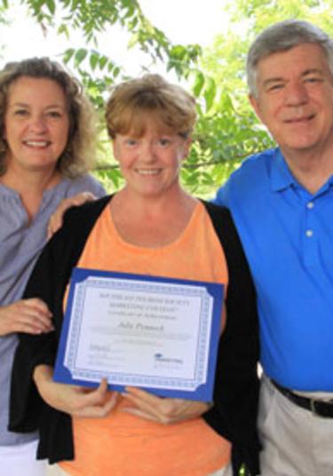 Julie Pennock, Marketing Coordinator for the Punta Gorda/Englewood Beach Visitor & Convention Bureau (center); with Suzanne Moon, VP Operations for the Southeast Tourism Society and Bill Hardman, President and CEO for the Southeast Tourism Society.