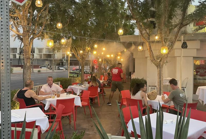 Chicken Ranch restaurant patio in Palm Springs at dusk.