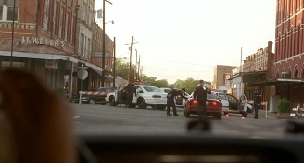 The Faculty screengrab showing the road block in downtown Lockhart Texas