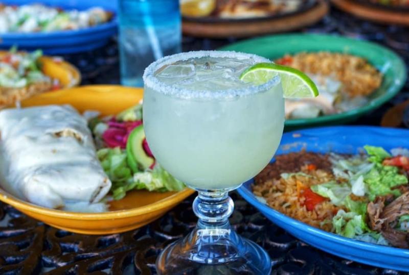 Several dishes and a margarita from Viva Mas