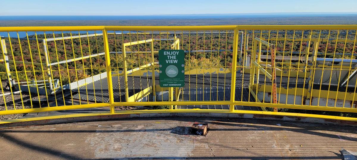 safety railing on the edge of a tall platorm