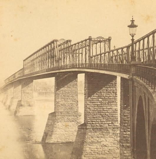 This is an old historic image of the Purple People Bridge from the late 19th century.