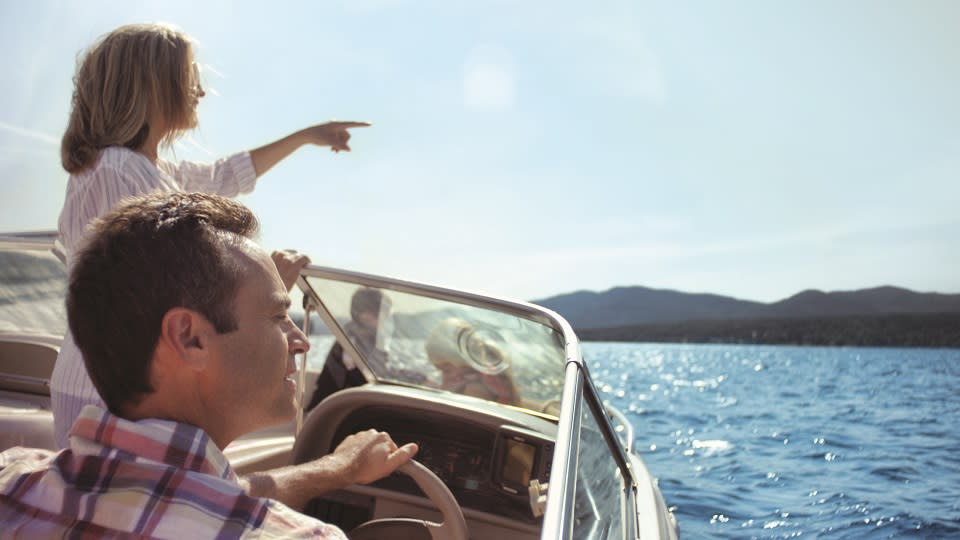 Couple on a motor boat on Lake George