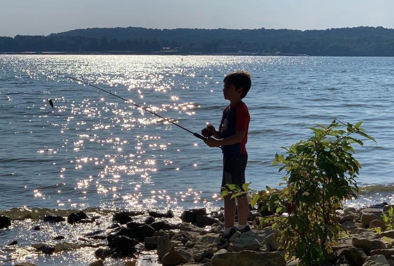 Little boy fishing at Hardin Ridge Recreation Area