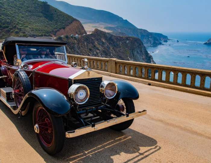 Classic car cruising along the coast for Monterey Car Week