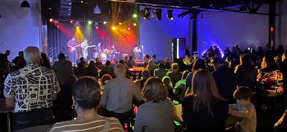 picture of a crowd gathered at Mars Music Hall to watch a band play