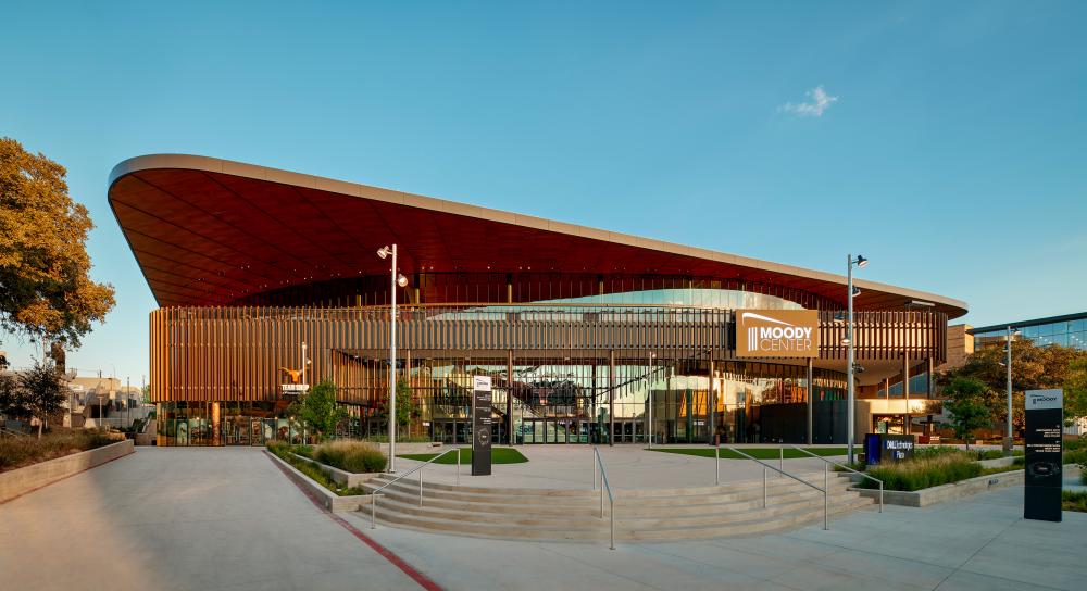 Exterior of Moody Center at University of Texas at Austin on a clear day.