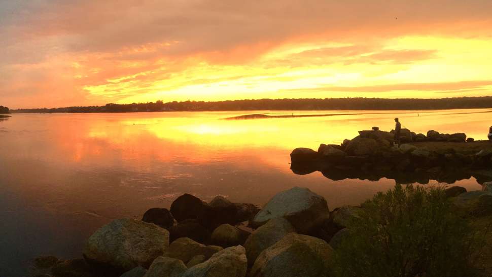 Panoramic photo of Quononchontaug Pond at sunset