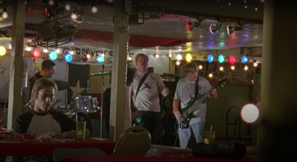 Friday Night Lights Screengrab showing the Broken Spoke as the Concert Venue for Crucifictorius band