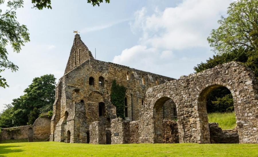 Battle Abbey ruins against a blue sky