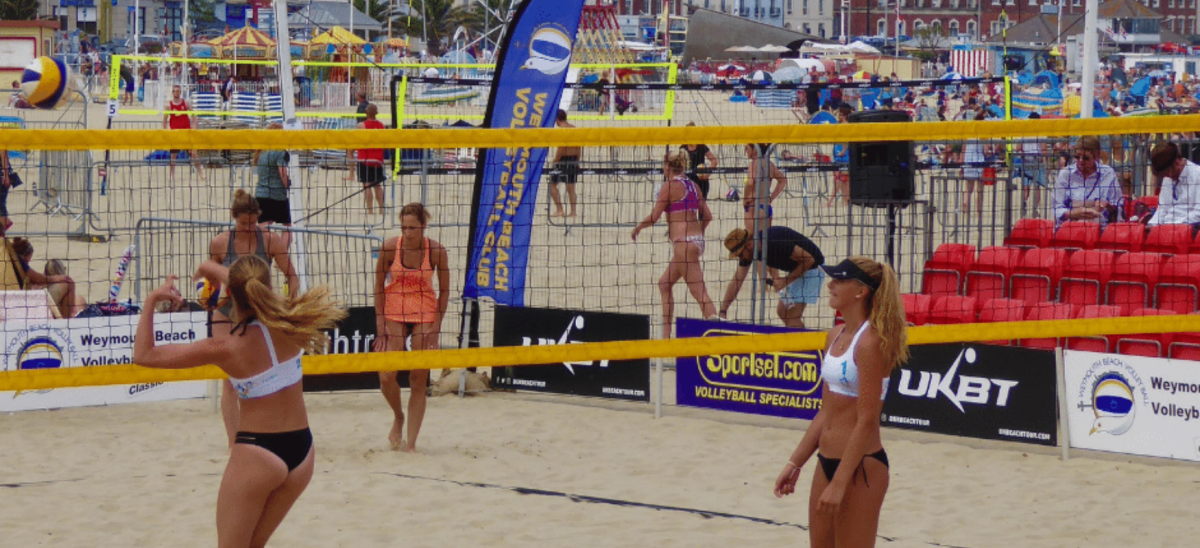 Girls playing beach volleyball