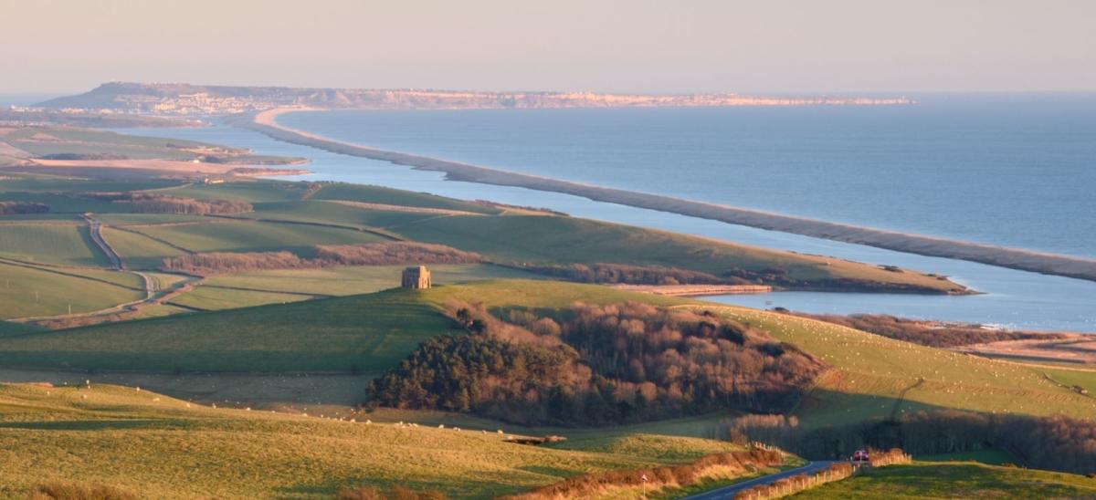 View of The Fleet lagoon and Chesil Beach from Abbotsbury in Dorset