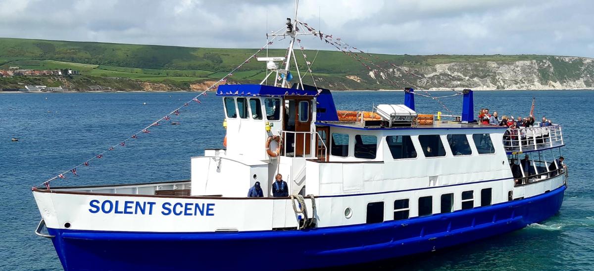 The Solent Scene boat at Swanage Pier run by Coastal Cruises