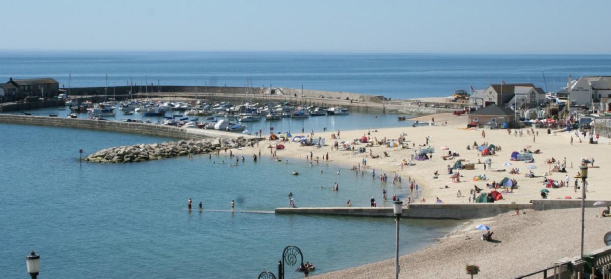 Lyme Regis sand and pebble beaches and harbour in Dorset