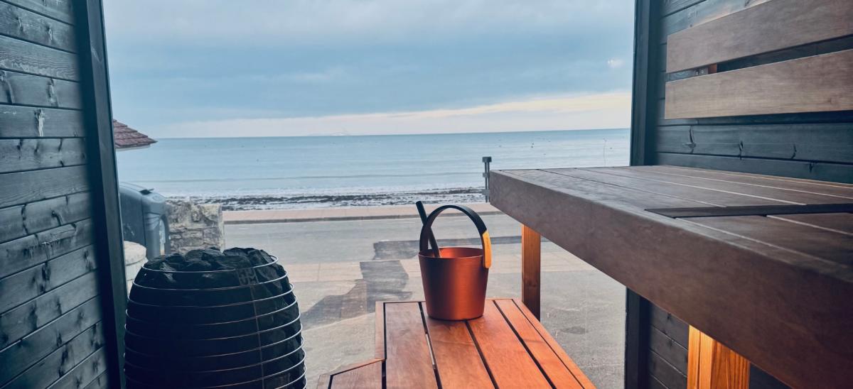Inside Swanage Bay Sauna with views of Swanage Beach