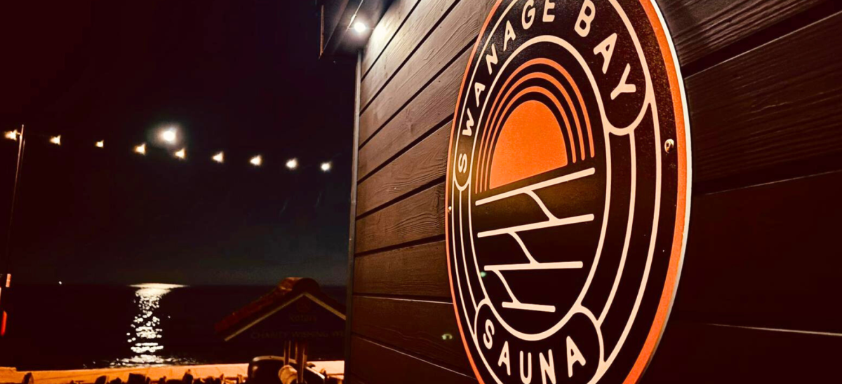 Outside of Swanage Bay Sauna at night.