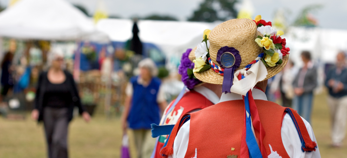 Morris Dancer back of head showing flowers on straw hat
